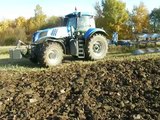 Powerful New Holland T8390 ploughing with reversible seven furrow plow