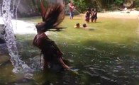 Woman Gracefully Wets Her Hair Like A Diva