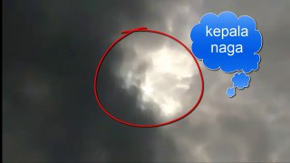 a total solar eclipse | appearance of a dragon , skull , and god kresna