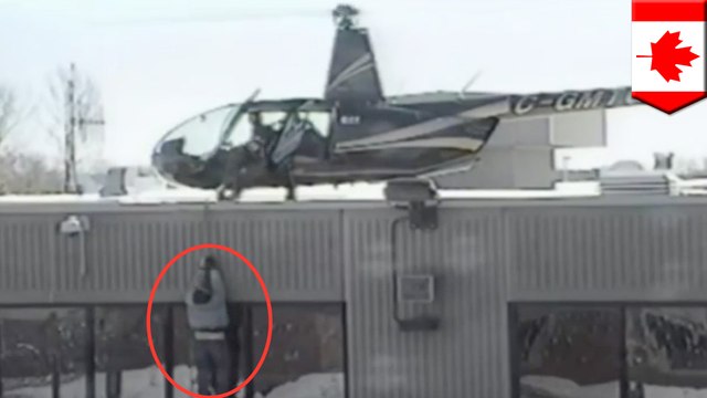 Dramatic video: helicopter lifts off with two inmates dangling on rope