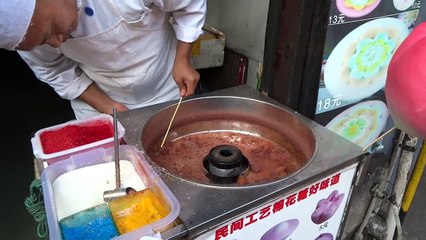 Flower made out of sugar by street food artist