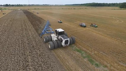 Big Bud with 21 bottom plow