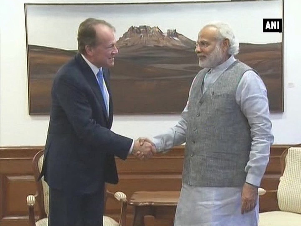 PM Modi meets CISCO chairman, ISKCON leader