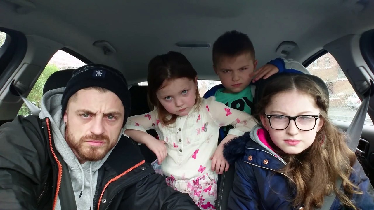 Dad listens Trance Electronic Music with his Kids in his Car