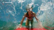 This seven-year-old girl is better at surfing than you