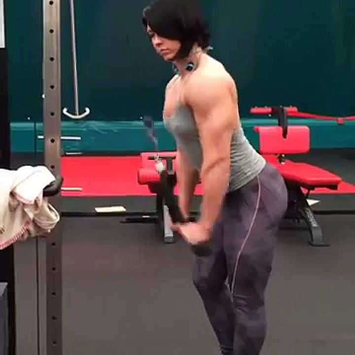 world fitness Gorgeous russian girls flexes awesome pecs while training her triceps