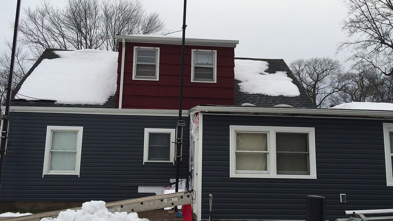 Butler NJ Affordable Siding Contractor 973 487 3704-Passaic County Affordable Home remodeling company serving Wayne Totowa Clifton Wycoff Woodland Park Paterson & New Jersey-Prices for additions add a level and vinyl siding roofing  installation