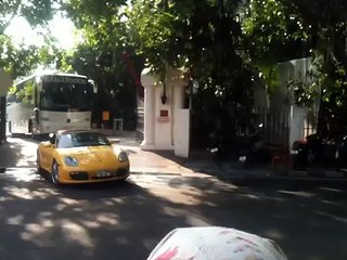 Dhoni on Yamaha RX Raina in Porsche and rest of the CSK team in benz bus near AlwarpetChennai