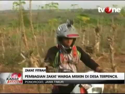 Bagikan Zakat Fitrah dengan Motor Trail