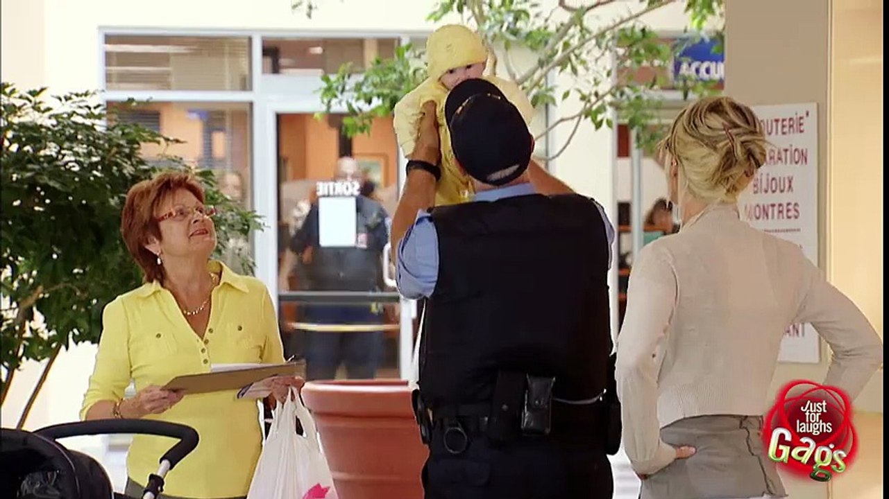 Adorable Baby Pukes on Cop