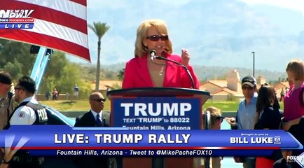 Trump rally: aide corrects Jan Brewer when she says Trump will build "fence" - "Say Wall!"