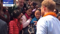 Prince Harry jokes with young fans in square in Nepal