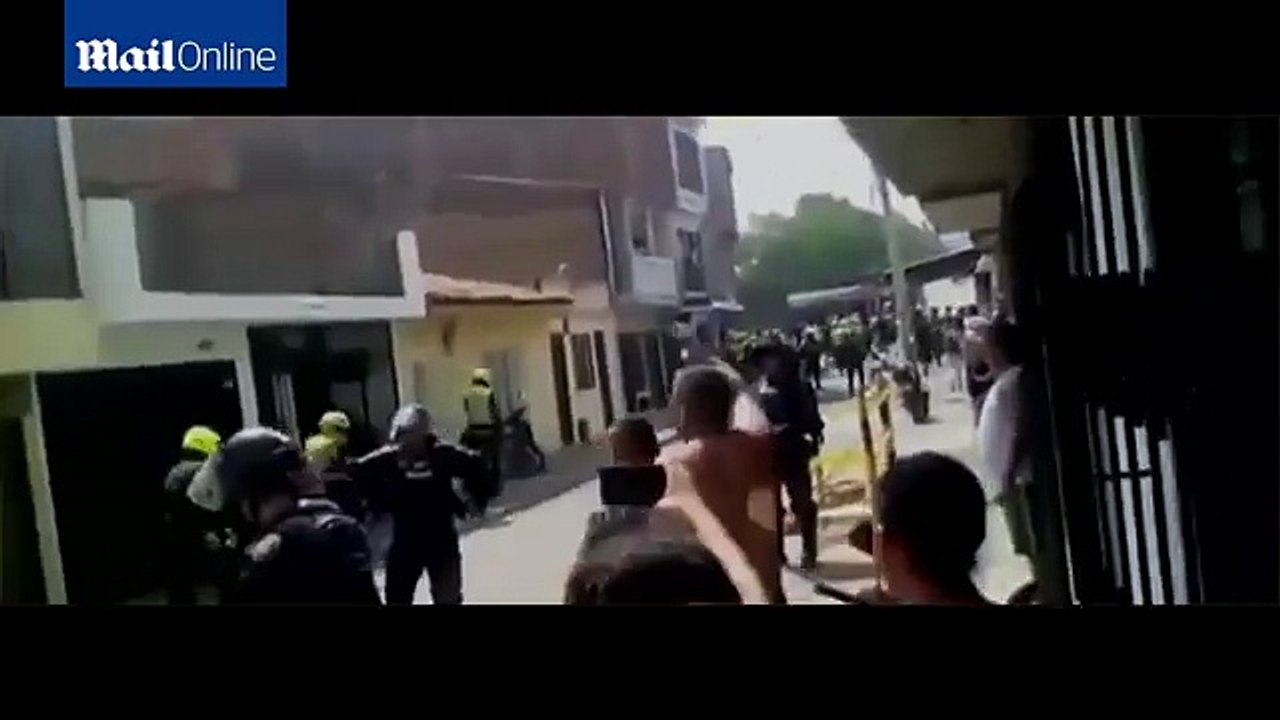 Colombian police officers save suspected 'paedophile' from public lynching