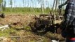 Belarus Mtz 82 stuck in deep mud, extreme conditions in wet forest