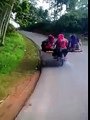 Polygamous Muslim with 4 wives and 4 kids on motorbike excursion