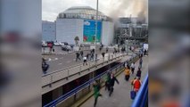 People flee Brussels airport after blasts