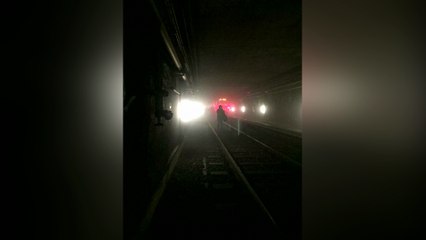 Mobile phone footage shows commuters walking through tunnel after Brussels blasts