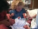 Darling Girl Calms Newborn Sister by Doing the Sweetest Thing - Aww - YouTube