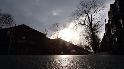 People And Cars Crossing The Street