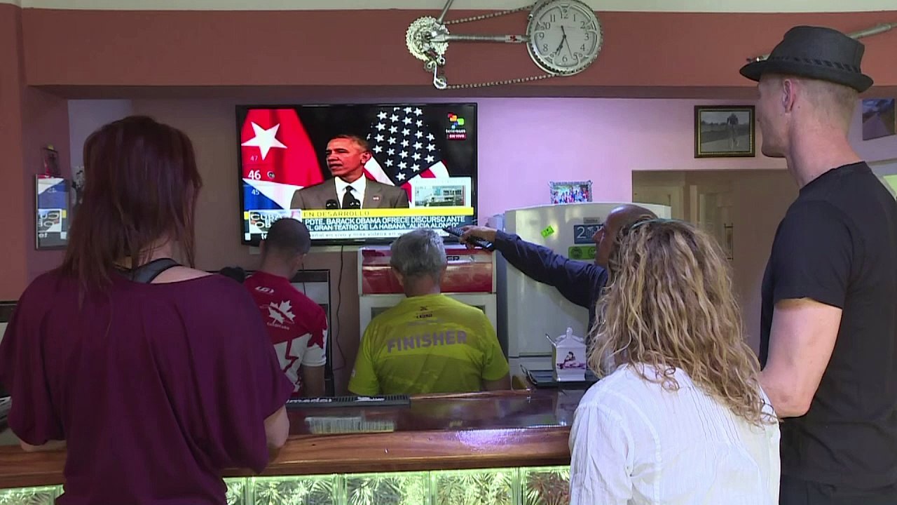 Cubans, US tourists in Havana react to Obama TV speech