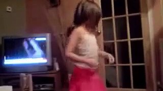 Little girl funny dancing and falling over
