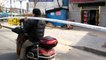Man carries six-metre long pipe while driving a scooter