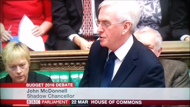 Osborne laughing at his mate's phone while asked to apologise to disabled people in parliament