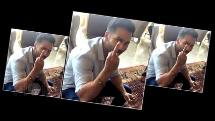 WTF ! Varun Dhawan Shows Middle Finger To A Fan At Airport