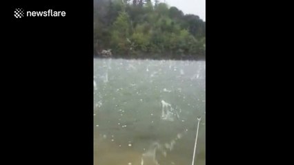 Massive hail stones smash into Chinese lake