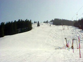 me skiing on red slope