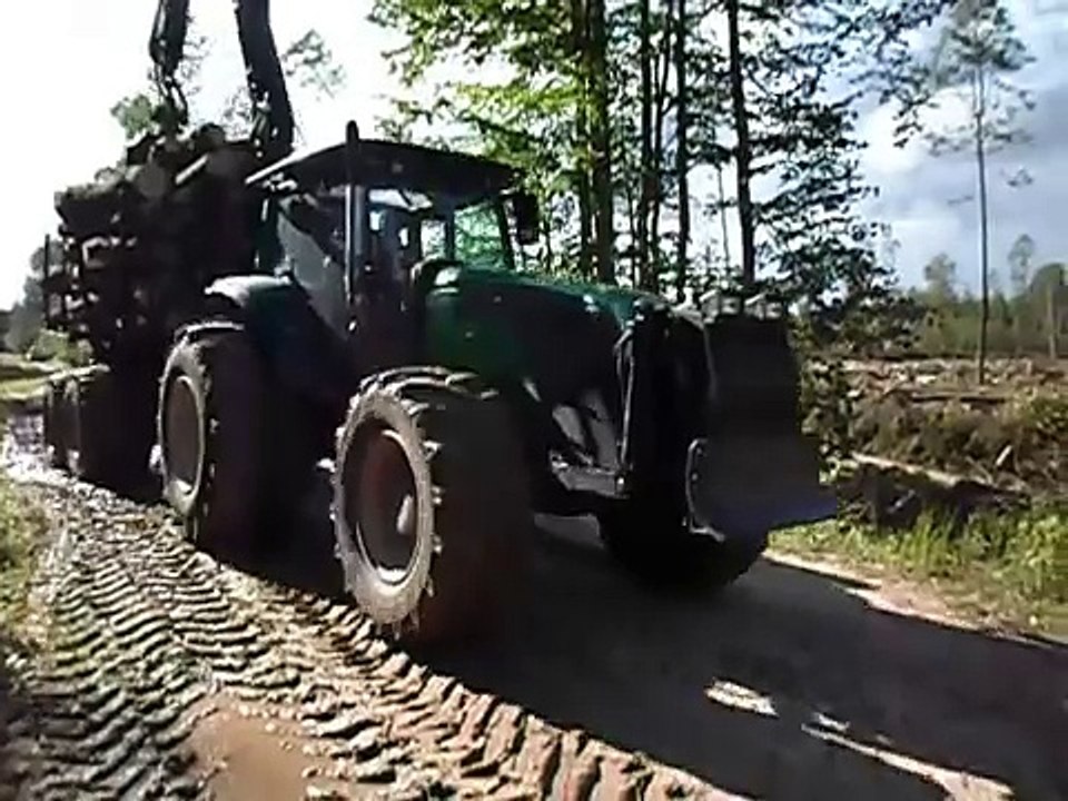 Valtra T131h forestry tractor with big homemade trailer