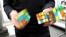 Собрать три кубика Рубика и при этом жонглировать ими