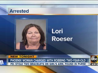 Phoenix woman charged with robbing 2-year-old