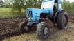 Old, reliable tractor Belarus Mtz 52 ploughing