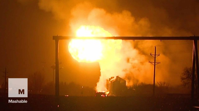Huge fireball bursts in the sky after train crashes into propane truck