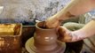 Making an Olla plant self watering clay pot on the potters