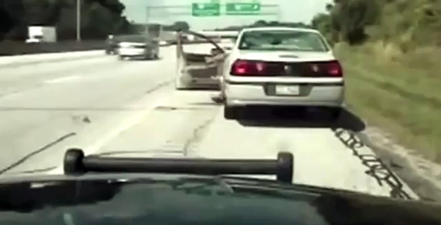 Man runs into the middle of the highway