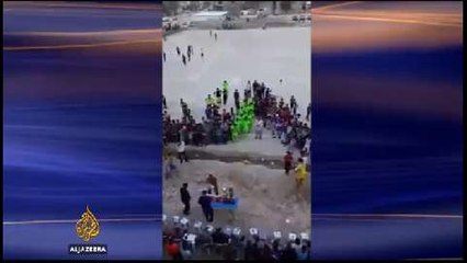 Phone camera captures suicide bombing in Iraq stadium