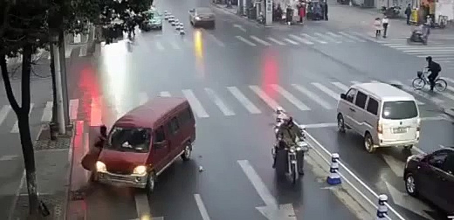 Woman ran over by van