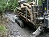 Belarus Mtz 1025 forestry tractor, punctured wheel in mud