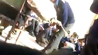 Teacher Brutally Beating Student