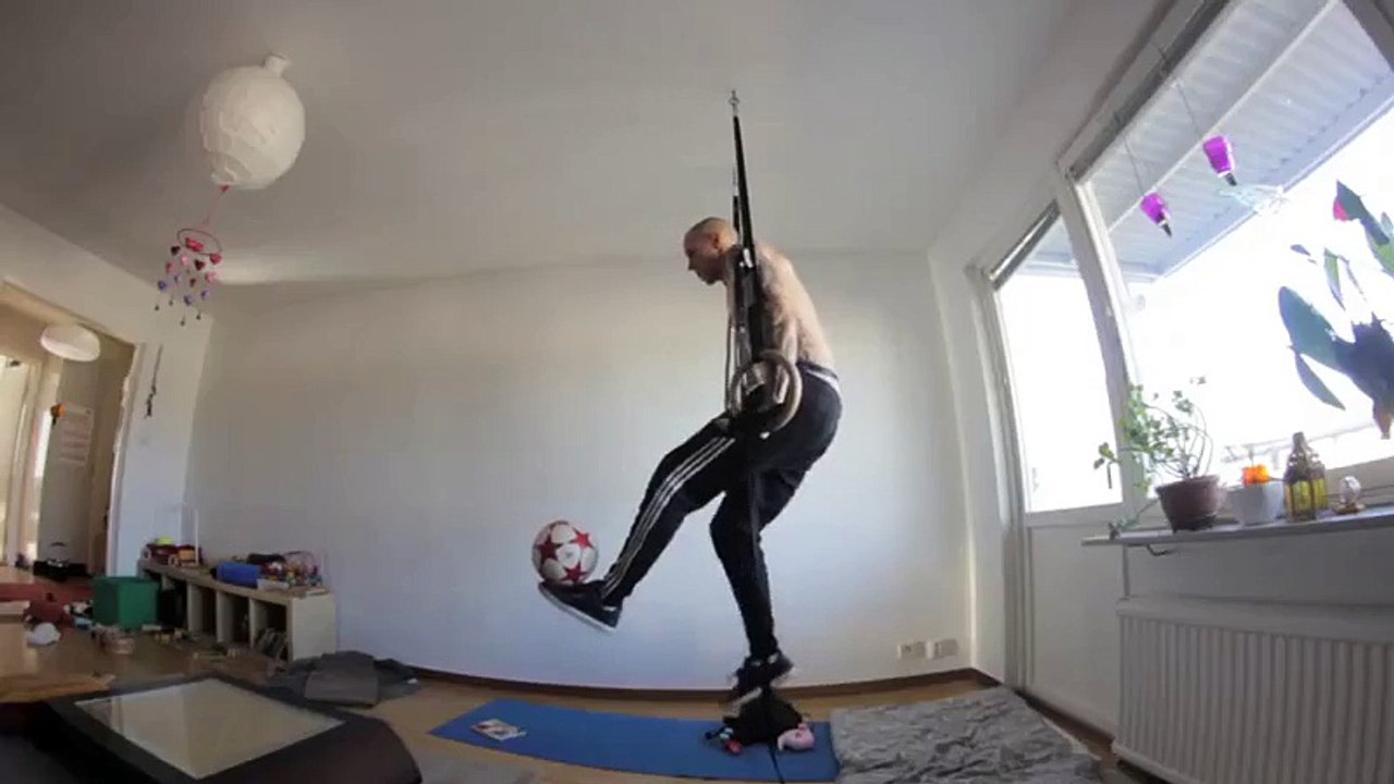 Football Tricks While Hanging with Rope
