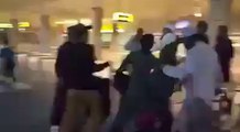 People beating Junaid Jamshed at airport