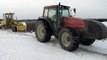 Grader stuck in mud, saving with Valtra 8150 2