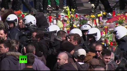 Riot police push back far-right protesters at Brussels memorial rally