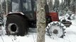 Belarus Mtz 1025 forestry tractor stuck in mud, difficult conditions
