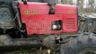 Belarus Mtz 892 with homemade trailer in wet forest