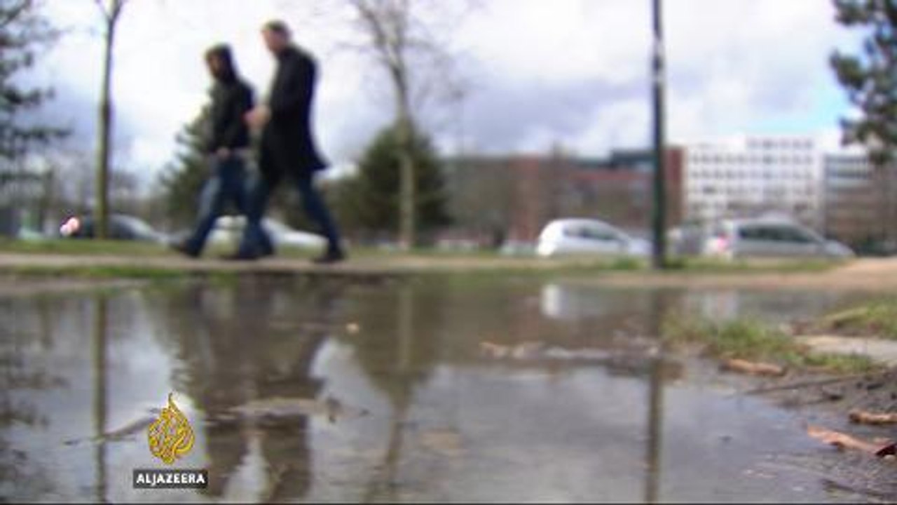 Right-wing protesters march at shrine for Brussels attack victims