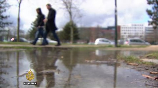 Right-wing protesters march at shrine for Brussels attack victims