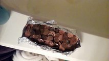 Tin foil boats holding pennies { my first video }